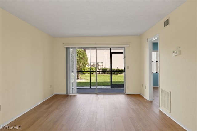 empty room featuring light hardwood / wood-style flooring