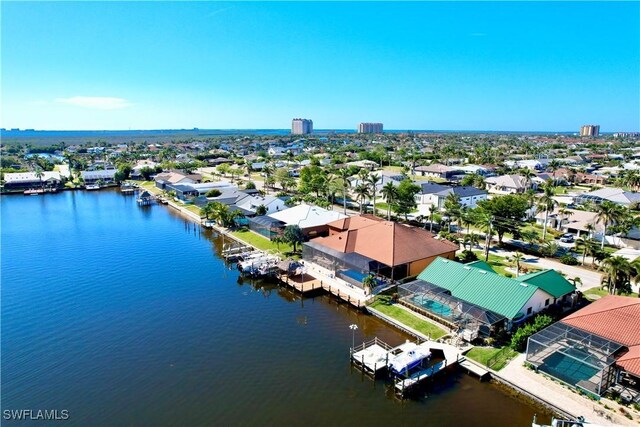 bird's eye view with a water view