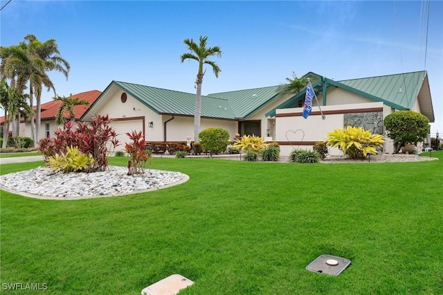 5331 Skyline Blvd, Cape Coral, FL 33914 - ranch-style house with a standing seam roof, an attached garage, stucco siding, and a front yard