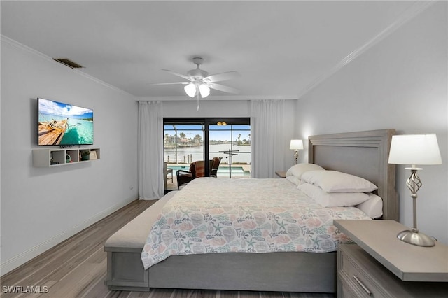 bedroom featuring ornamental molding, access to outside, ceiling fan, and light hardwood / wood-style floors