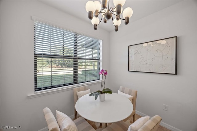 dining area with a chandelier