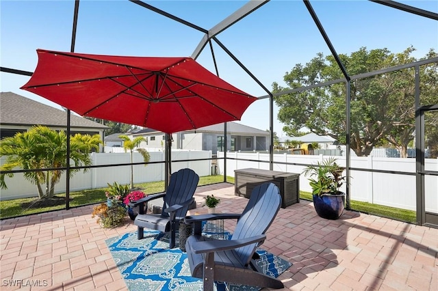 view of patio / terrace with a lanai