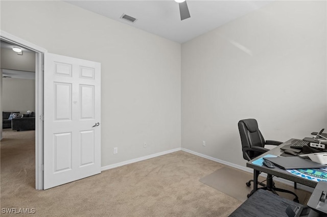 office area with light carpet and ceiling fan