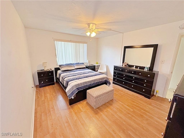 bedroom featuring hardwood / wood-style floors and ceiling fan