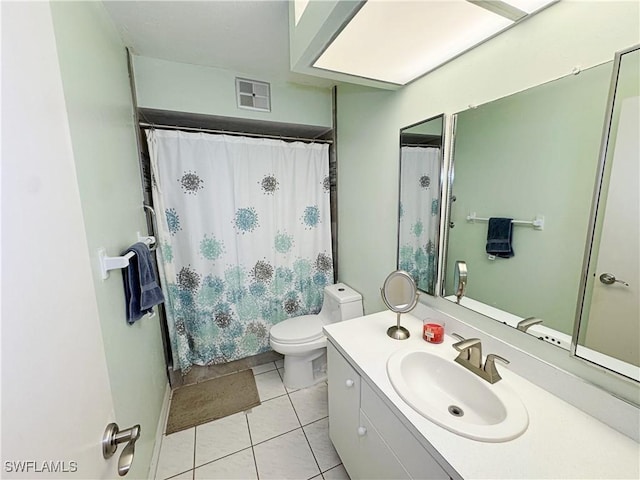 bathroom with tile patterned flooring, vanity, toilet, and a shower with shower curtain