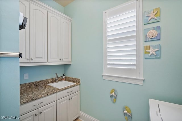 laundry room featuring sink