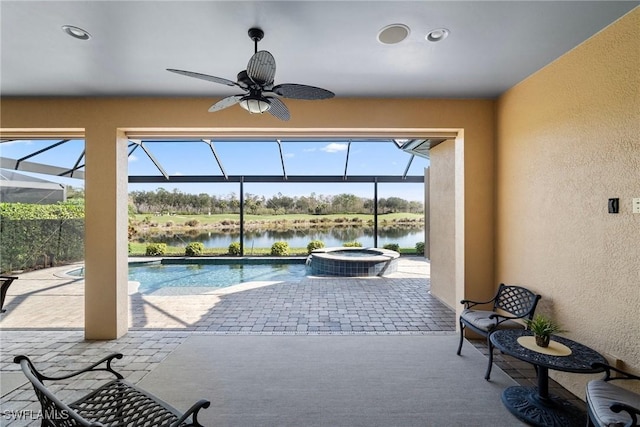 view of pool featuring a water view and ceiling fan