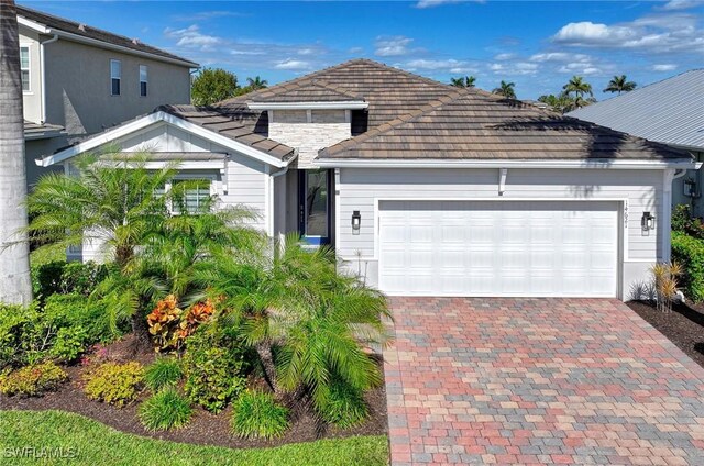 view of front of property with a garage