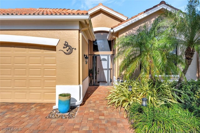 entrance to property featuring a garage