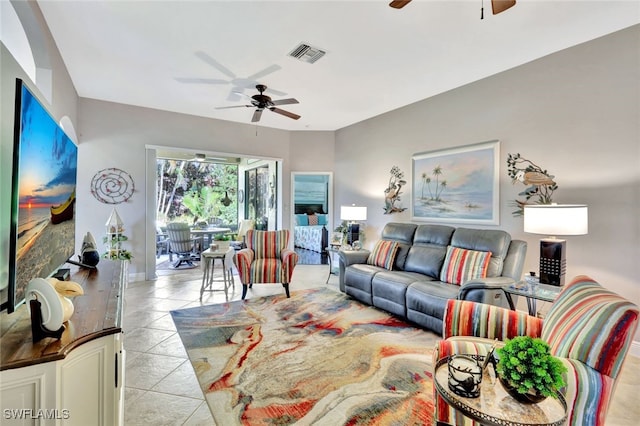 tiled living room with ceiling fan