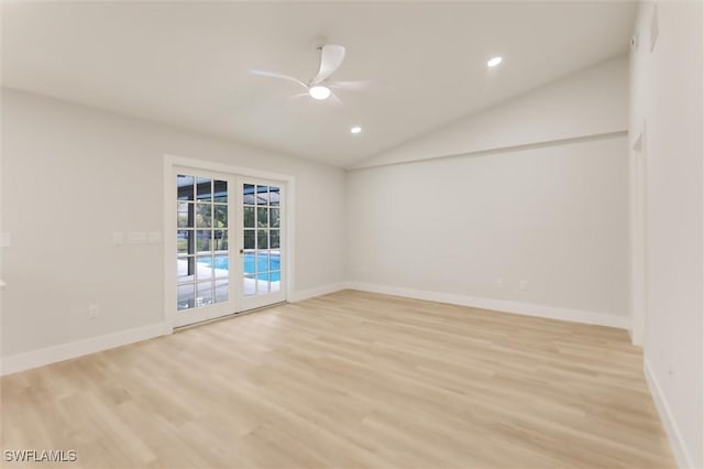 unfurnished room featuring ceiling fan, lofted ceiling, and light wood-type flooring