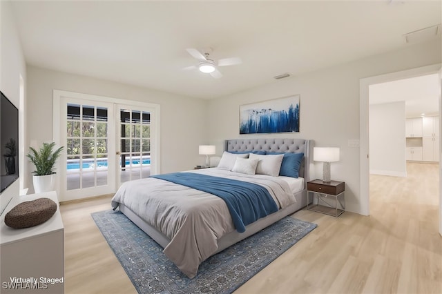 bedroom featuring access to exterior, french doors, ceiling fan, and light wood-type flooring