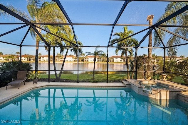 view of pool featuring a water view, an in ground hot tub, a lanai, and a patio area