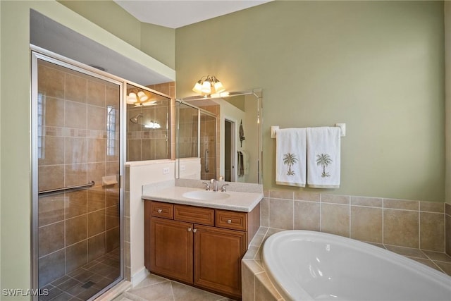 bathroom with vanity, separate shower and tub, and tile patterned flooring