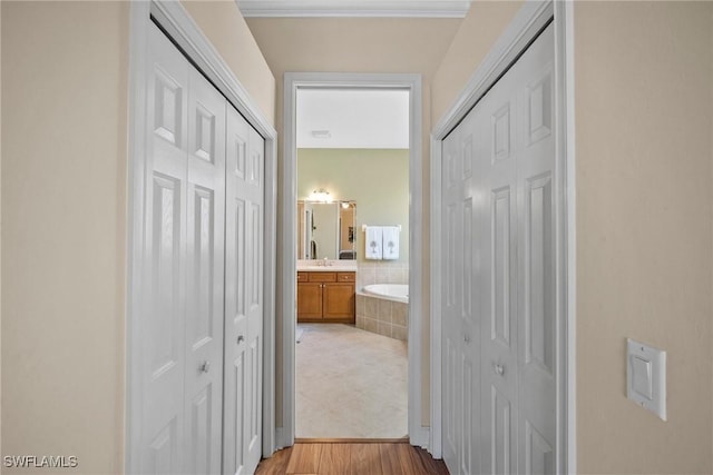 hallway featuring light hardwood / wood-style flooring