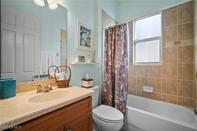 full bathroom featuring vanity, toilet, and shower / bath combo with shower curtain