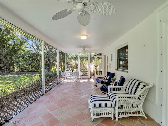 sunroom / solarium with ceiling fan