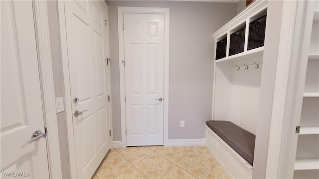 mudroom with light tile patterned flooring