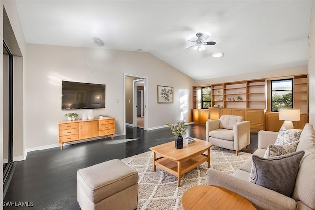 living room featuring hardwood / wood-style flooring, ceiling fan, and lofted ceiling