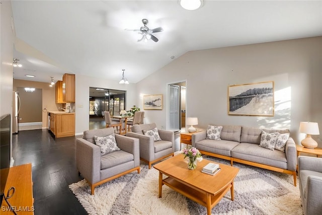 living room with vaulted ceiling, dark wood-type flooring, sink, and ceiling fan