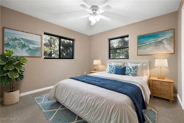 carpeted bedroom with ceiling fan