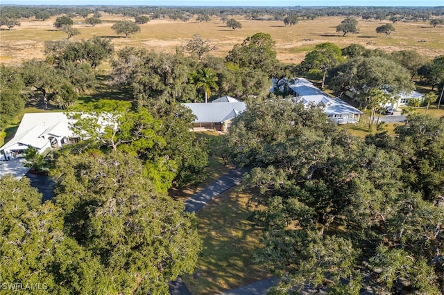 birds eye view of property featuring a rural view