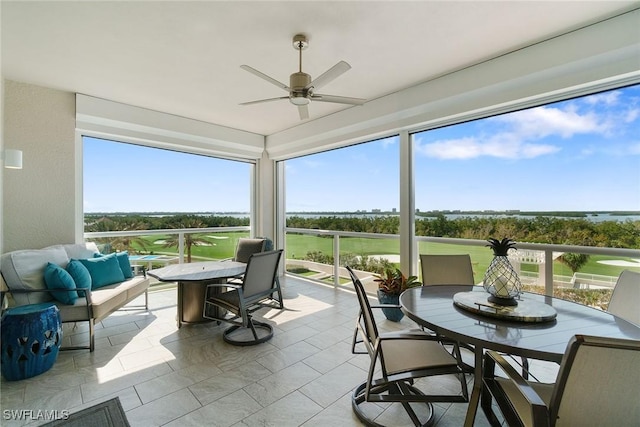 sunroom / solarium with ceiling fan