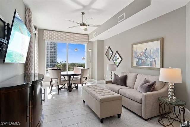 living room featuring ceiling fan