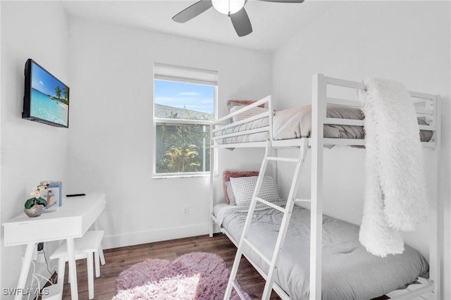 bedroom with hardwood / wood-style flooring and ceiling fan