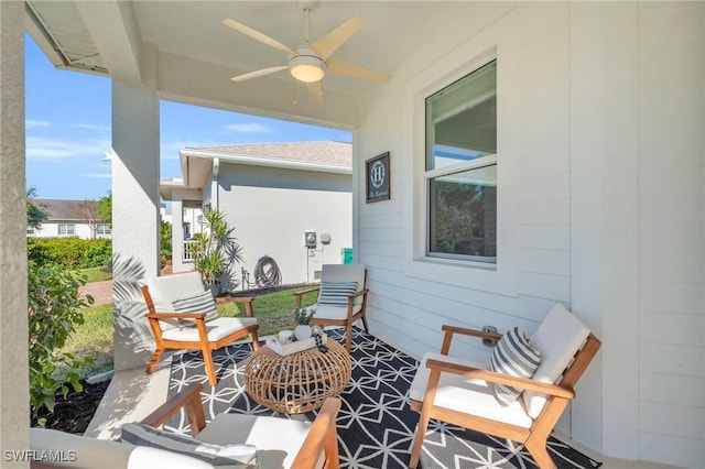 balcony featuring ceiling fan