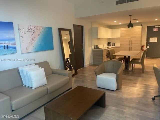 living room featuring light hardwood / wood-style flooring