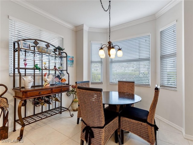 tiled dining area featuring crown molding and a notable chandelier