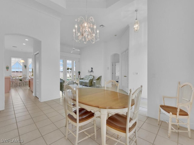 dining area featuring plenty of natural light and light tile patterned floors