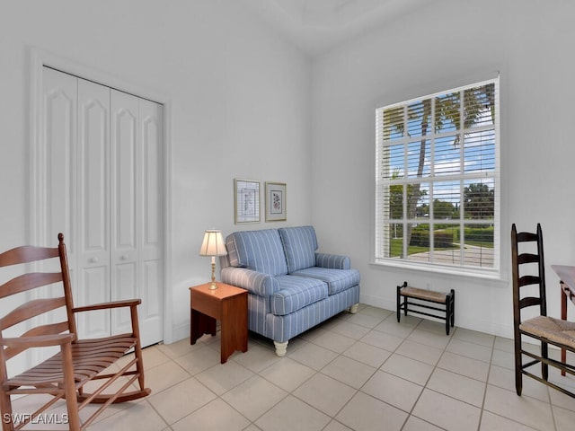 sitting room with light tile patterned floors