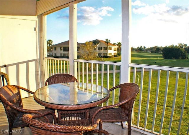 balcony featuring outdoor dining area