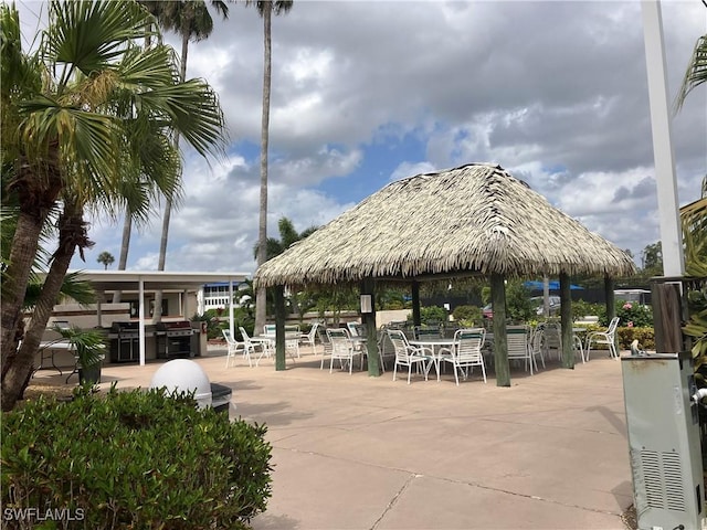 surrounding community with a patio area and a gazebo