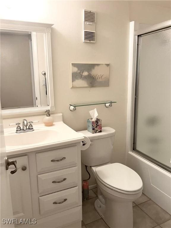 1580 Pine Valley Dr Unit 217, Fort Myers, FL 33907 - full bathroom with tile patterned flooring, vanity, and bath / shower combo with glass door