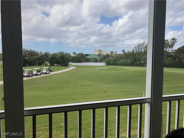 1580 Pine Valley Dr Unit 217, Fort Myers, FL 33907 - view of grassy yard featuring a water view