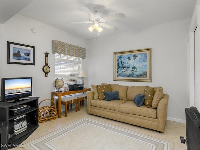 tiled living room featuring ceiling fan