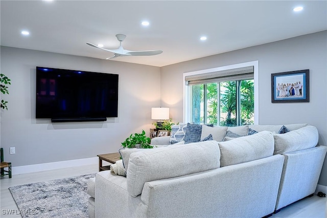 living room with ceiling fan