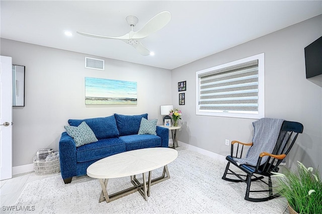 living room with ceiling fan