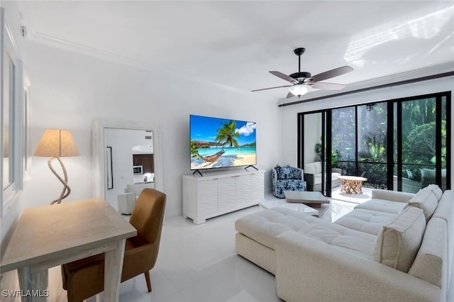 living room with crown molding and ceiling fan