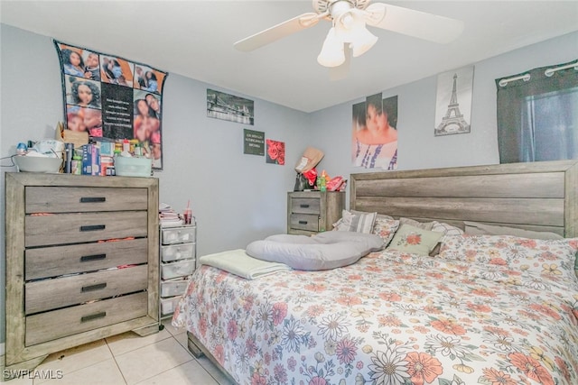 217/219 Ivan Ave S, Lehigh Acres, FL 33973 - bedroom with ceiling fan and tile patterned floors