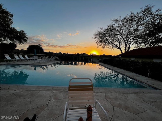 view of pool featuring a patio area and a fenced in pool