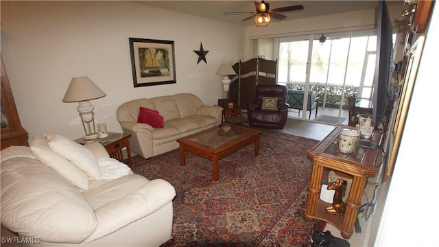 tiled living room with ceiling fan