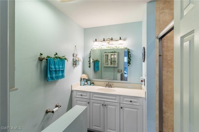 bathroom featuring vanity and walk in shower