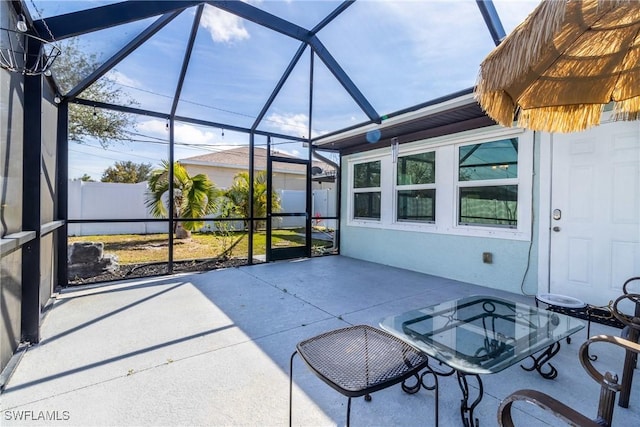 view of patio / terrace with a lanai