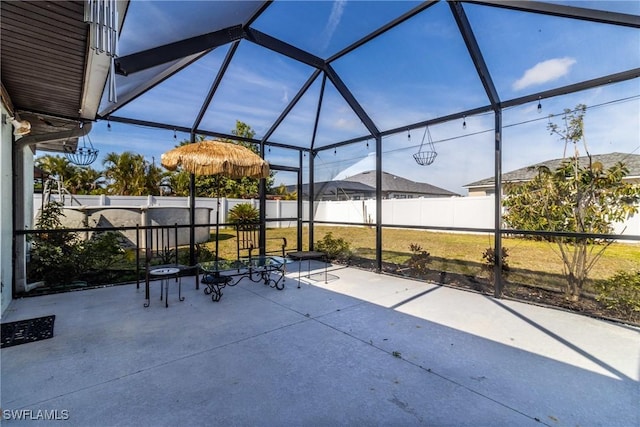 view of patio / terrace with glass enclosure