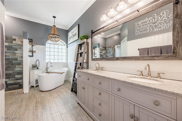 bathroom featuring plus walk in shower, wood-type flooring, vanity, and crown molding