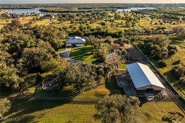 bird's eye view with a water view and a rural view